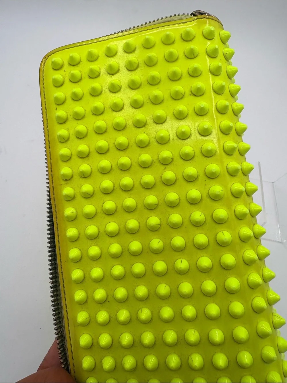 Christian Louboutin neon wallet